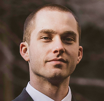 Retrato de Thomas Whitfield, analista de trading y especialista en mercado cripto